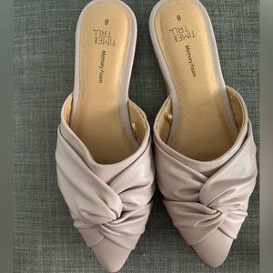 Worn once! Blush flats with a cross cross top